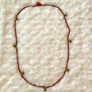 Noonday Collection pink and gold necklace